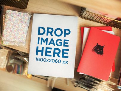 Magazine Lying on a Wooden Table Inside a Small Store Near Other Books Template