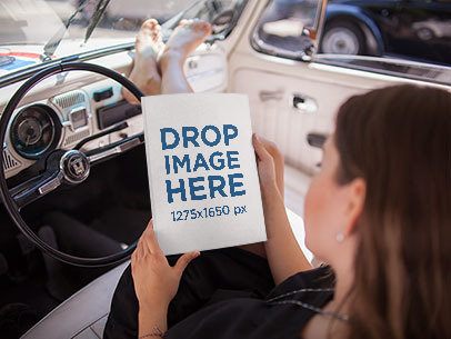 Template of a Young White Girl Holding a Book While Relaxing in the Front Seat of a Car a14391