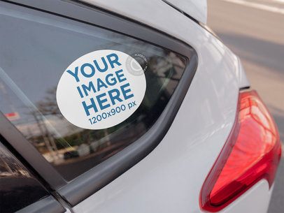 Mockup of an Oval Sticker on the Quarter Glass of a Car