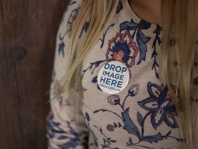 Little Button on a Blonde Woman Crewneck Against a Wooden Wall