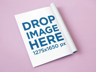 Open Folded Magazine Lying Over a Pink Surface Mockup