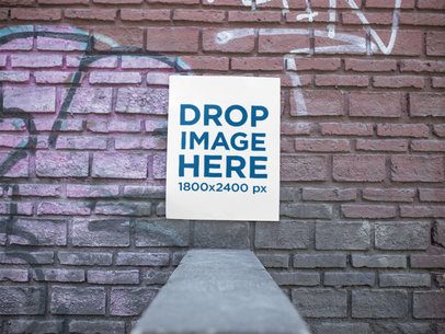 Poster on an Old Bricks Wall With Graffitis Mockup