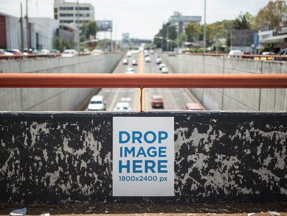 Poster on a Black Wall With a Big Avenue on the Back Mockup