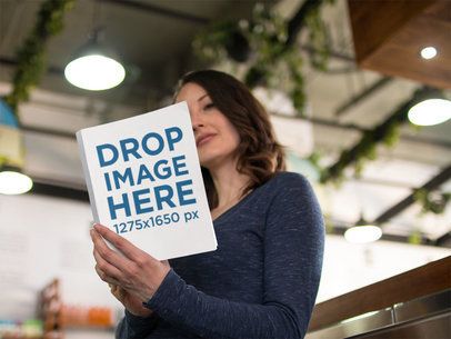 Girl Reading a Book at a Convention Mockup a14424