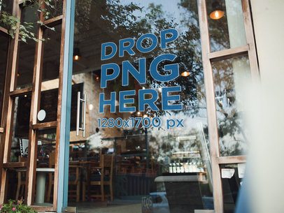 Mockup of a Window Decal Between Wooden Structure