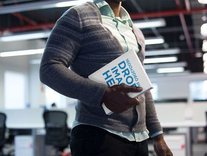 Ebook Cover Mockup of a Young Man at a Corporate Office