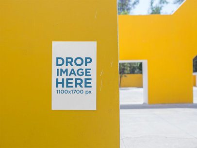 Poster on a Yellow Wall of an Urban Structure Mockup