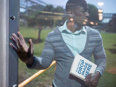 Middle Aged Man Walking Through a Window Door While Holding a Book in his Hand Mockup