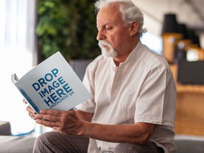 Elder Man Reading a Book While at the Work Section in a Hotel Mockup