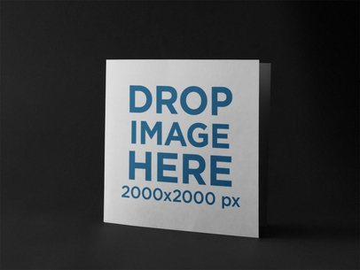 Square Booklet Standing in a Black Environment Mockup