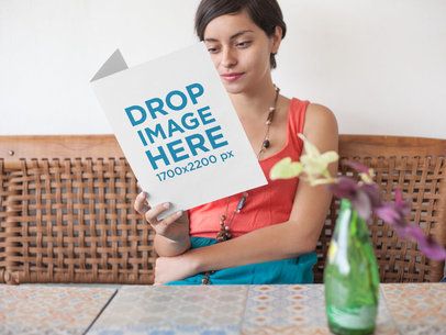 Young Girl Reading a Restaurant Menu While Sitting Down Template a14626