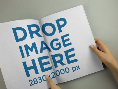 Catalog Being Read by a Girl While on a Gray Surface Template a14596