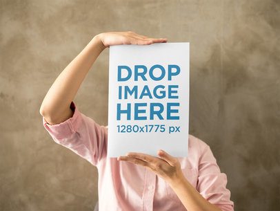 Girl Wearing a Pink Shirt While Covering Her Face with a Catalog Template a14654