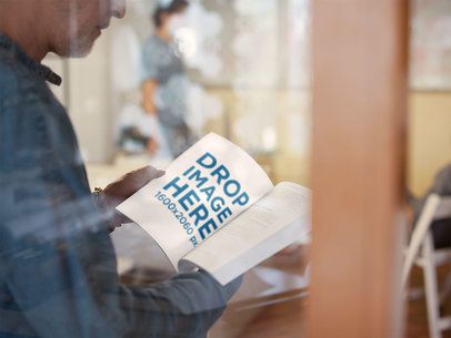Through the Window Mockup of a Man Reading a Book