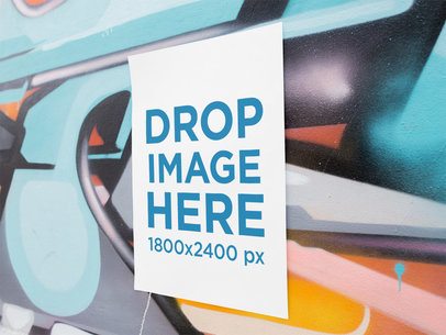 Mockup of a Poster on a Colorful Graffiti Wall