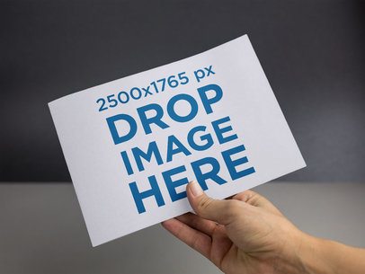 Postcard Mockup Held Up by Someone