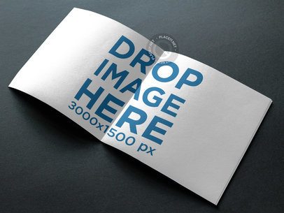 Mockup of an Open Manual on a Black Surface a14583