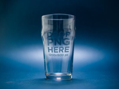 Mockup of an Empty Nonic Pint Beer Glass Against a Dark Blue Background