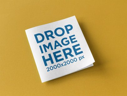Square Booklet Lying on a Yellow Surface Template a14581