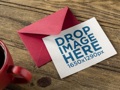 Invite Template with Red Envelope and Red Coffee Mug on a Wooden Table