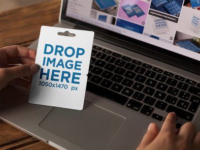 Girl Entering a Gift Card Template Code on a Laptop a14739