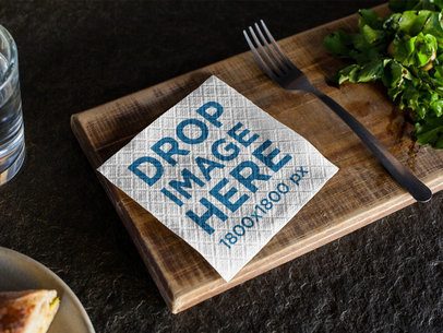 Napkin Mockup on a Small Wooden Board at a Restaurant
