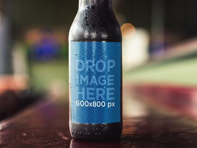 Dark Beer Bottle Label Template While on a Counter Bar