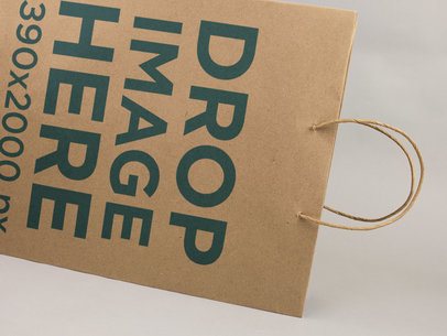 Close Up Template of a Paper Shopping Bag On a White Surface