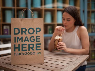 Paper Bag Template Standing on Table While Girl Drinks Frapuccino a14744