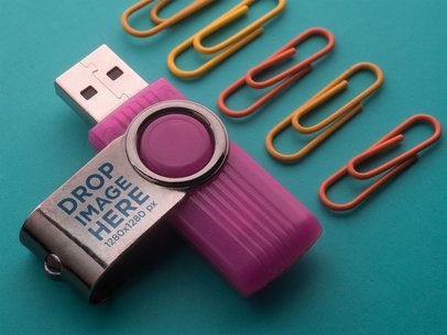 Purple USB Flash Drive Template Lying on a Turquoise Surface Near Clamps a6545