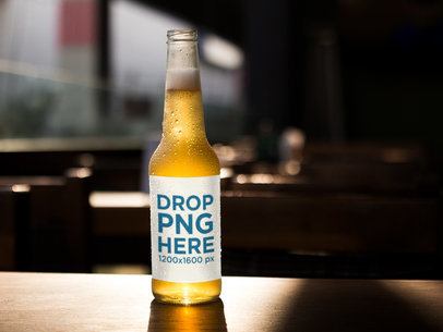 Open Gold Lager Beer Bottle Template on a Wooden Surface a14783