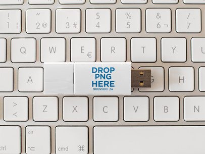 USB Flash Drive Template Lying Over a White Keyboard a14908