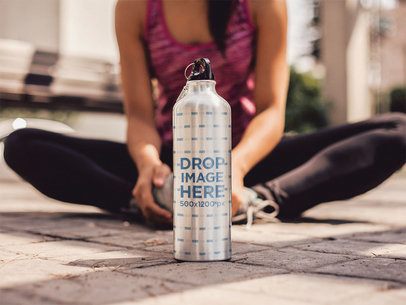 Woman Sitting Next to an Aluminum Water Bottle Mockup