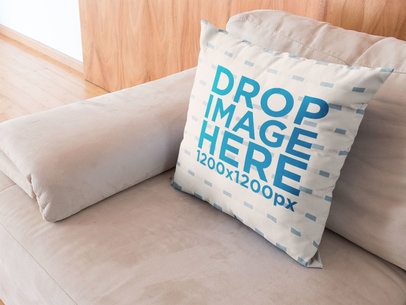 Square Pillow Template Lying on a Sofa
