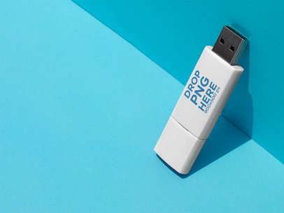White USB Flash Drive Template Standing Against a Sky Blue Surface a14912