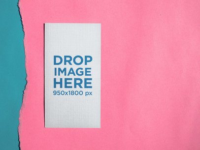 Vertical Business Card Mockup Lying on Pink Ripped Paper a15012