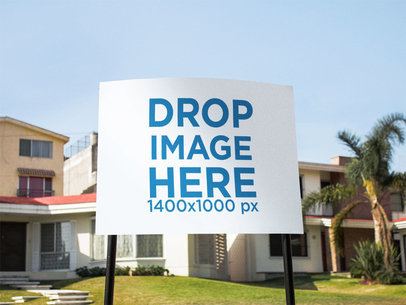 Mockup of a Real Estate Lawn Sign in the Front Yard of a House